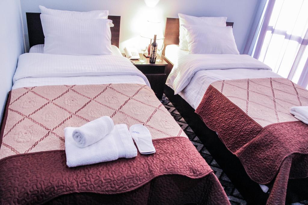 Royal Georgia Hotel Тбилиси Стая снимка